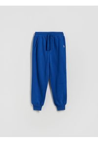 Reserved - Bawełniane spodnie jogger - niebieski. Kolor: niebieski. Materiał: bawełna