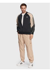 Adidas - adidas Spodnie dresowe Ozworld HL9251 Beżowy Regular Fit. Kolor: beżowy. Materiał: syntetyk, dresówka