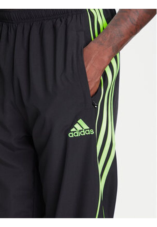 Adidas - adidas Spodnie dresowe Teamgeist adicolor JW5869 Czarny Loose Fit. Kolor: czarny. Materiał: syntetyk