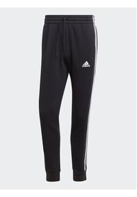 Adidas - adidas Spodnie dresowe IB4030 Czarny Regular Fit. Kolor: czarny. Materiał: bawełna