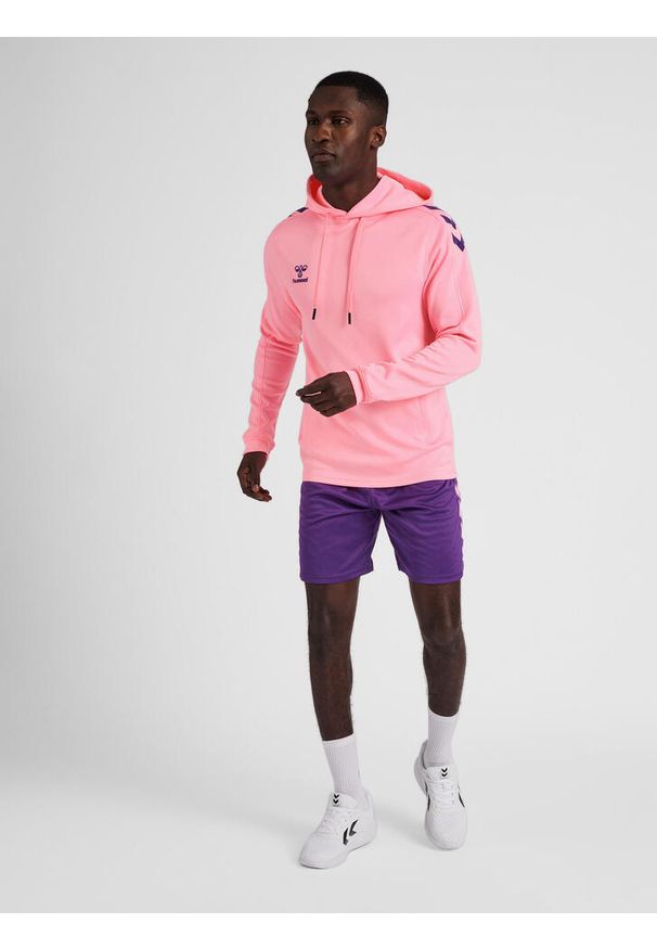 Bluza do piłki ręcznej dla dorosłych Hummel hml CORE XK poly z kapturem. Typ kołnierza: kaptur. Kolor: różowy. Sport: piłka ręczna