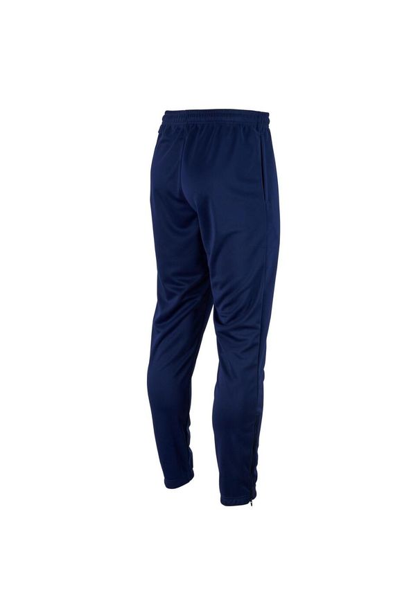 Spodnie piłkarskie dla dzieci Puma teamRISE Poly Training Pants Jr. Kolor: niebieski. Materiał: poliester