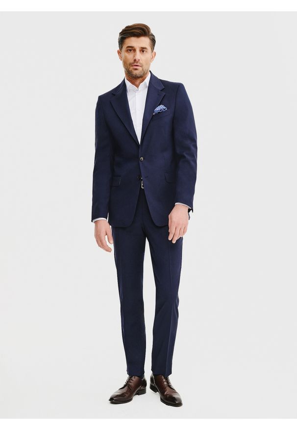 Pako Lorente - PAKO LORENTE – Wełniane spodnie garniturowe w kolorze granatowym. Okazja: na spotkanie biznesowe. Kolor: niebieski. Materiał: wełna. Styl: elegancki, biznesowy