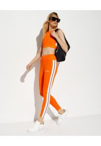PALM ANGELS - Pomarańczowe legginsy z lampasami. Stan: podwyższony. Kolor: pomarańczowy. Styl: elegancki #4