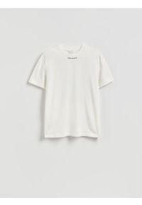 Reserved - T-shirt regular z nadrukiem na plecach - złamana biel. Materiał: bawełna, dzianina. Wzór: nadruk