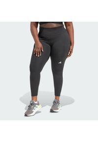 Adidas - Legginsy Own the Run 7/8 (Plus Size). Kolekcja: plus size. Kolor: czarny. Materiał: materiał. Wzór: gładki. Sport: bieganie