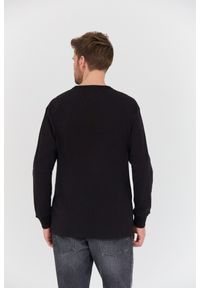 Tommy Jeans - TOMMY JEANS Czarny longsleeve. Kolor: czarny. Długość rękawa: długi rękaw