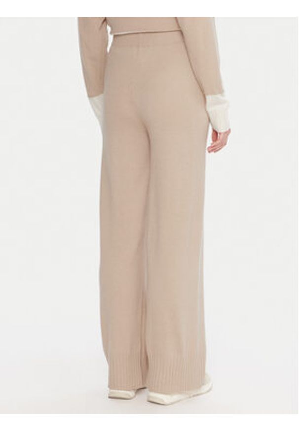 United Colors of Benetton - United Colors Of Benetton Spodnie dzianinowe 102HDF00Z Beżowy Wide Leg. Kolor: beżowy. Materiał: wełna, syntetyk