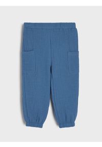 Sinsay - Jeansy jogger z gumką w pasie - niebieski. Kolor: niebieski #1