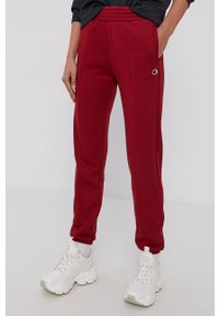 Champion Spodnie damskie kolor bordowy gładkie. Kolor: czerwony. Materiał: dzianina, bawełna. Wzór: gładki