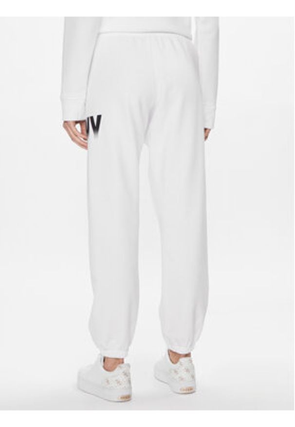 DKNY Sport Spodnie dresowe DP3P3379 Biały Relaxed Fit. Kolor: biały. Materiał: bawełna, syntetyk