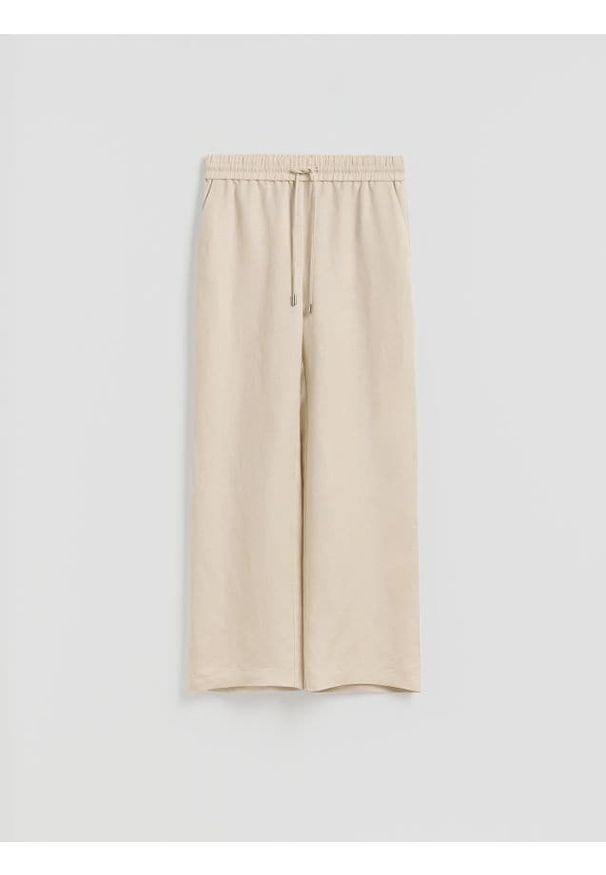 Reserved - Luźne spodnie z lnem - beżowy. Kolor: beżowy. Materiał: len