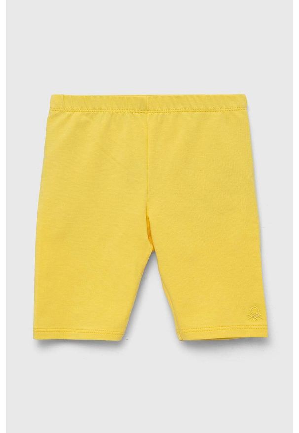 United Colors of Benetton legginsy dziecięce kolor żółty gładkie. Kolor: żółty. Materiał: dzianina. Długość: długie. Wzór: gładki