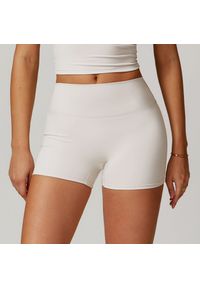 Intica - Krótkie legginsy sportowe z wysokim stanem i oddychającym materiałem Betsi. Stan: podwyższony. Kolor: szary. Materiał: materiał. Długość: krótkie. Sport: fitness