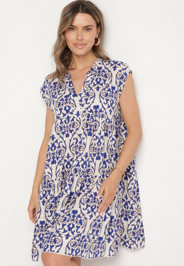 Born2be - Niebieska Bawełniane Sukienka o Rozkloszowanym Kroju Ozdobiona Falbanką Linola. Okazja: na co dzień. Kolor: niebieski. Materiał: bawełna. Wzór: aplikacja. Sezon: lato. Styl: elegancki, casual