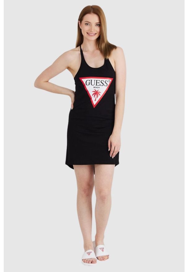 Guess - GUESS Czarna damska sukienka na ramiączka z trójkątnym logo, Rozmiar M. Kolor: czarny. Materiał: bawełna. Długość rękawa: na ramiączkach. Wzór: nadruk