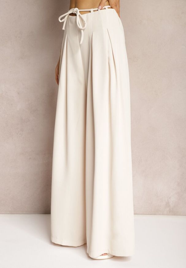 Renee - Jasnobeżowe Szerokie Spodnie High Waist Zapinane na Suwak z Wiązaniem w Talii Vikonnia. Okazja: na co dzień. Stan: podwyższony. Kolor: beżowy. Styl: klasyczny, casual, elegancki