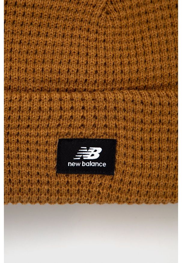 New Balance - Czapka. Kolor: brązowy. Materiał: włókno, dzianina