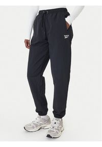 Reebok Spodnie dresowe Galina RK25518CCW Czarny Relaxed Fit. Kolor: czarny. Materiał: syntetyk #1