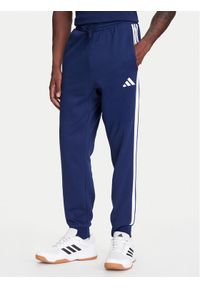 Adidas - adidas Spodnie dresowe Essentials 3-Stripes JD1859 Niebieski Regular Fit. Kolor: niebieski. Materiał: syntetyk