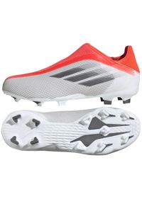 Adidas - Buty piłkarskie adidas X Speedflow.3 Ll Fg Jr FY3256 czerwone czerwony, biało-szary. Kolor: biały, czerwony, wielokolorowy, szary. Materiał: dzianina, syntetyk. Szerokość cholewki: normalna. Sport: piłka nożna