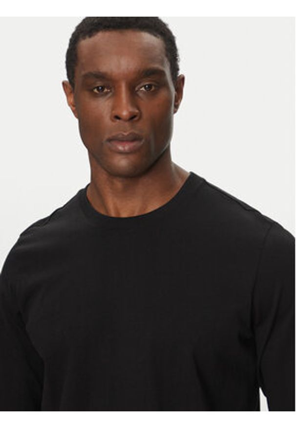 Champion Longsleeve 221164 Czarny Loose Fit. Kolor: czarny. Materiał: bawełna. Długość rękawa: długi rękaw