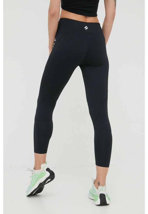 Superdry legginsy damskie kolor czarny z nadrukiem. Kolor: czarny. Materiał: skóra, materiał. Wzór: nadruk