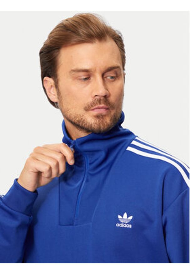 Adidas - adidas Bluza adicolor Funnel IX5216 Niebieski Regular Fit. Kolor: niebieski. Materiał: bawełna, syntetyk