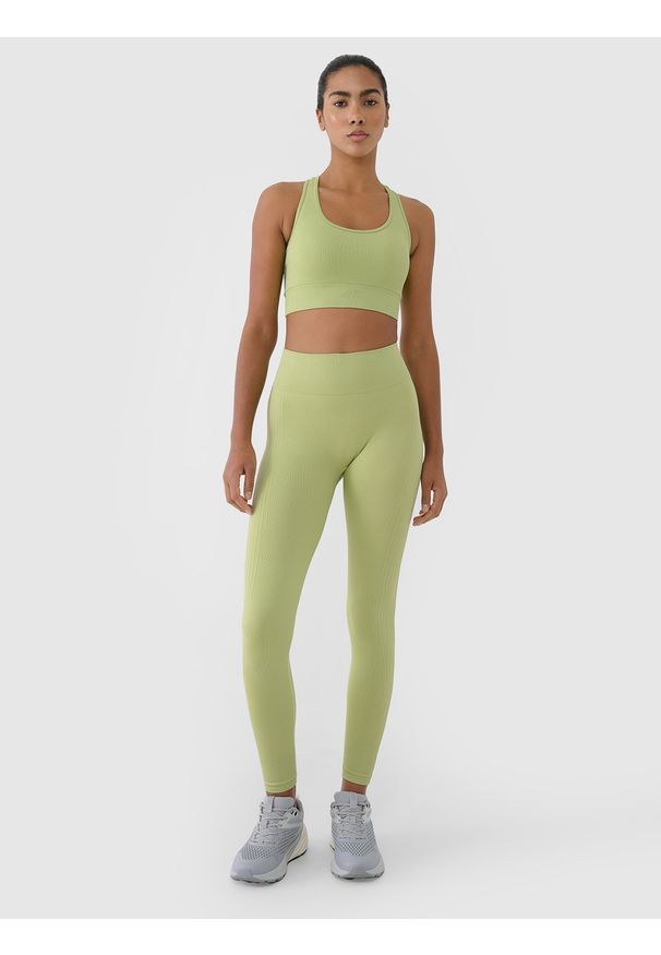 4f - 4F Legginsy treningowe bezszwowe damskie - zielone XS/S. Stan: podwyższony. Kolor: zielony. Materiał: elastan, materiał, włókno, dzianina, syntetyk. Wzór: ze splotem, gładki, jednolity. Sport: fitness