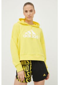 adidas Performance bluza bawełniana damska kolor żółty z kapturem z nadrukiem. Typ kołnierza: kaptur. Kolor: żółty. Materiał: bawełna. Wzór: nadruk #1