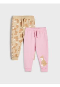 Sinsay - Spodnie dresowe 2 pack - beżowy. Kolor: beżowy. Materiał: dresówka. Długość: długie #1