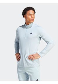 Adidas - adidas Koszulka techniczna Train Essentials Seasonal Training IJ9620 Błękitny Regular Fit. Kolor: niebieski. Materiał: syntetyk