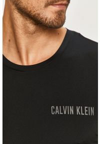 Calvin Klein Performance - T-shirt. Kolor: czarny. Materiał: dzianina. Wzór: nadruk
