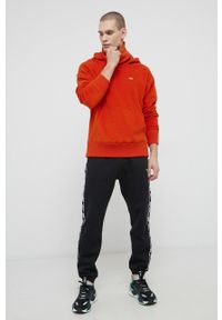 Tommy Jeans Bluza męska kolor pomarańczowy z kapturem gładka. Typ kołnierza: kaptur. Kolor: pomarańczowy. Materiał: poliester. Wzór: gładki