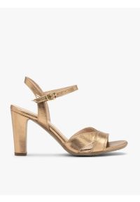 Ryłko - Złote sandały na grubej szpilce. Kolor: złoty. Materiał: skóra. Obcas: na obcasie. Styl: street. Wysokość obcasa: średni #1