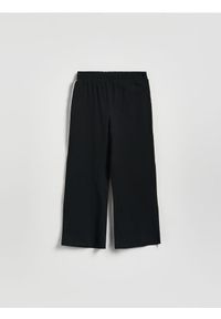 Reserved - Spodnie dresowe z lampasem - czarny. Kolor: czarny. Materiał: dresówka #1