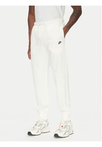 Nike Spodnie dresowe FN3801 Écru Regular Fit. Materiał: bawełna