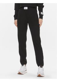 Guess Spodnie dresowe Aislin V4RB01 KC2T0 Czarny Regular Fit. Kolor: czarny. Materiał: syntetyk