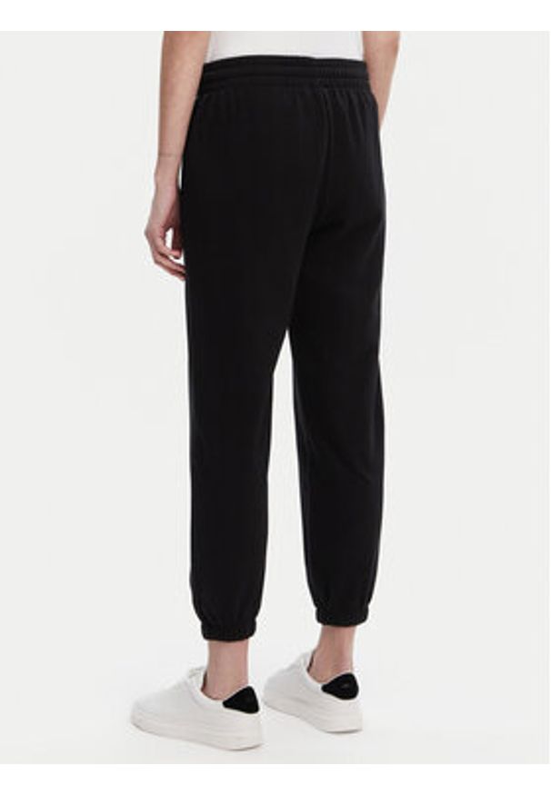 GAP - Gap Spodnie dresowe 889527-00 Czarny Relaxed Fit. Kolor: czarny. Materiał: bawełna