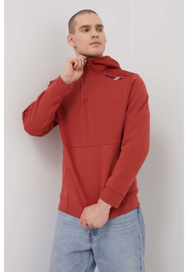 Puma bluza 84743623 męska kolor czerwony z kapturem gładka. Okazja: na co dzień. Typ kołnierza: kaptur. Kolor: czerwony. Materiał: dzianina. Długość: krótkie. Wzór: gładki. Styl: casual