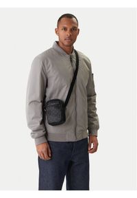 Calvin Klein Saszetka Emblem Aop Emboss Slim Reporter LV04D3228G Czarny. Kolor: czarny. Materiał: skóra #1
