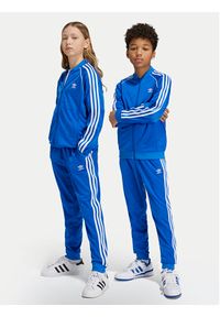 Adidas - adidas Spodnie dresowe adicolor SST IY4007 Niebieski Regular Fit. Kolor: niebieski. Materiał: syntetyk #6