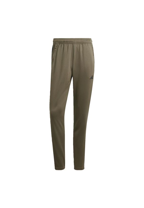 Adidas - Train Essentials 3-Stripes Training Pants. Kolor: zielony, czarny, wielokolorowy. Materiał: dresówka, materiał