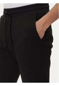 Calvin Klein Jeans Szorty sportowe J30J327247 Czarny Regular Fit. Kolor: czarny. Materiał: bawełna. Styl: sportowy