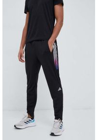 adidas Performance spodnie do biegania Run Icons kolor czarny z nadrukiem. Kolor: czarny. Materiał: skóra, materiał. Wzór: nadruk. Sport: bieganie #3