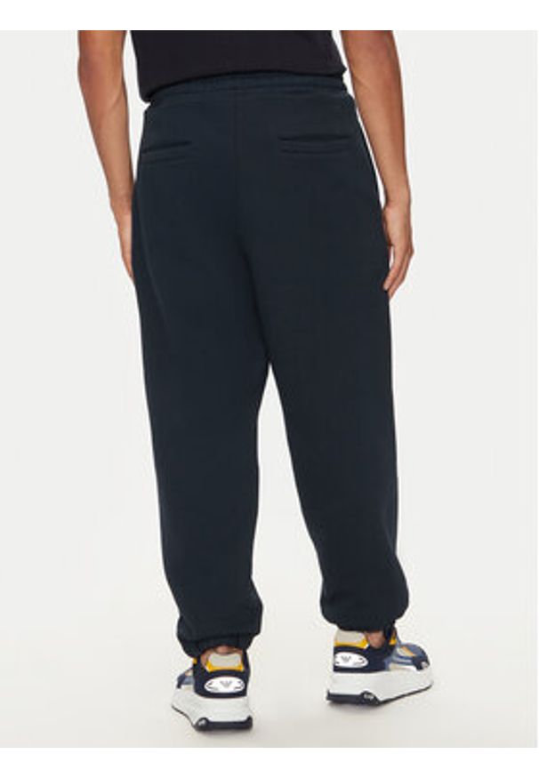 Armani Exchange Spodnie dresowe 6DZPAA ZJKAZ 1510 Granatowy Regular Fit. Kolor: niebieski. Materiał: bawełna