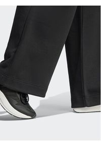 Adidas - adidas Spodnie dresowe IR8377 Czarny Loose Fit. Kolor: czarny. Materiał: bawełna, dresówka #4
