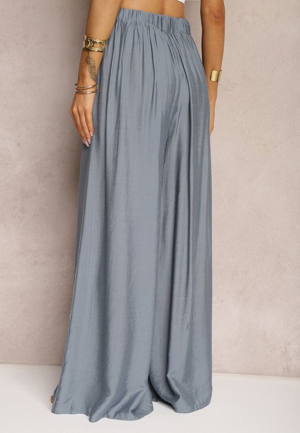 Renee - Niebieskie Luźne Spodnie z Szeroką Nogawką i Kieszeniami Cordya. Kolor: niebieski. Długość: długie