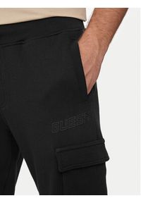 Guess Spodnie dresowe Aldwin Z4YB08 KAIJ1 Czarny Regular Fit. Kolor: czarny. Materiał: bawełna #3