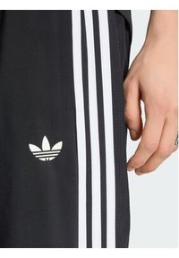 Adidas - adidas Spodnie dresowe 170070 Czarny Regular Fit. Kolor: czarny. Materiał: dresówka #2